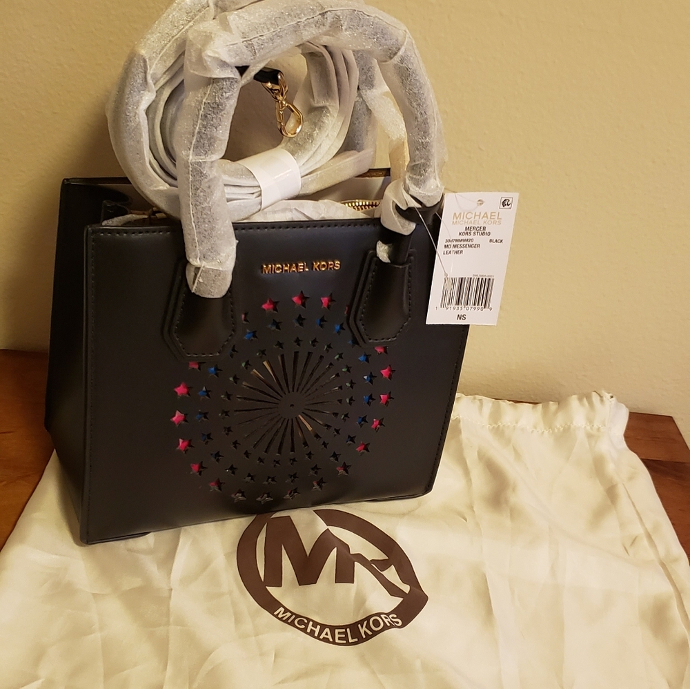 Michael Kors Black Mini Messenger Bag with Starburst Cutout